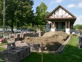 As the wall went up the dirt was redistributed.
